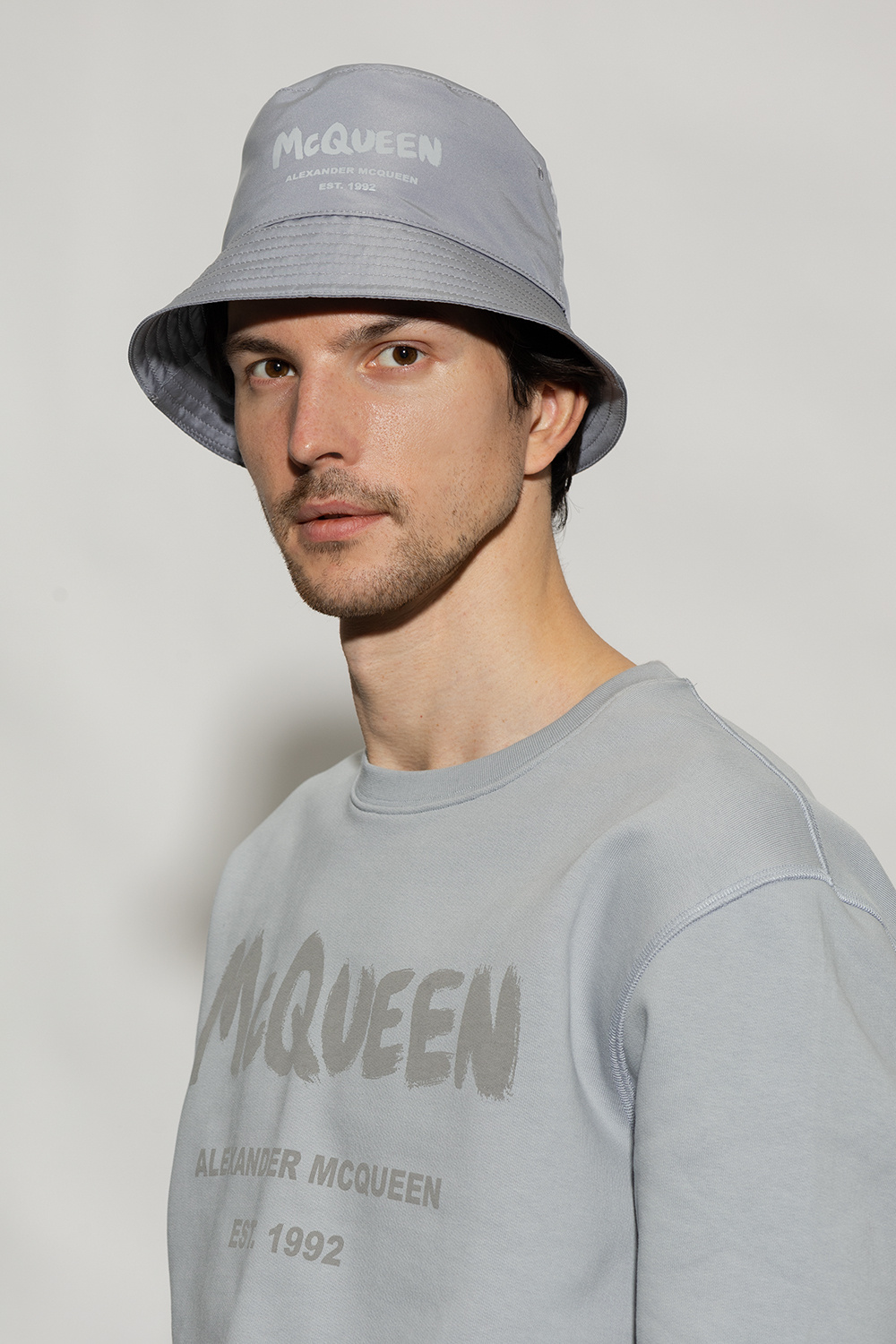 Grey Bucket cream hat with logo Alexander McQueen SchaferandweinerShops Canada Lyle Scott heritage zip bucket cream hat